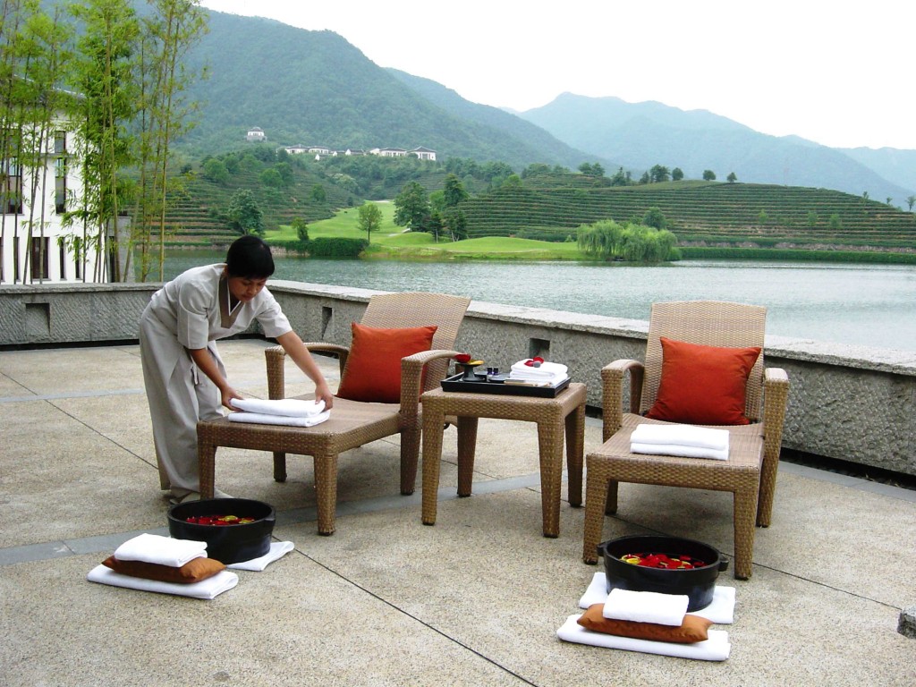 Enjoy a floral pedicure with a breathtaking view from your private villa.